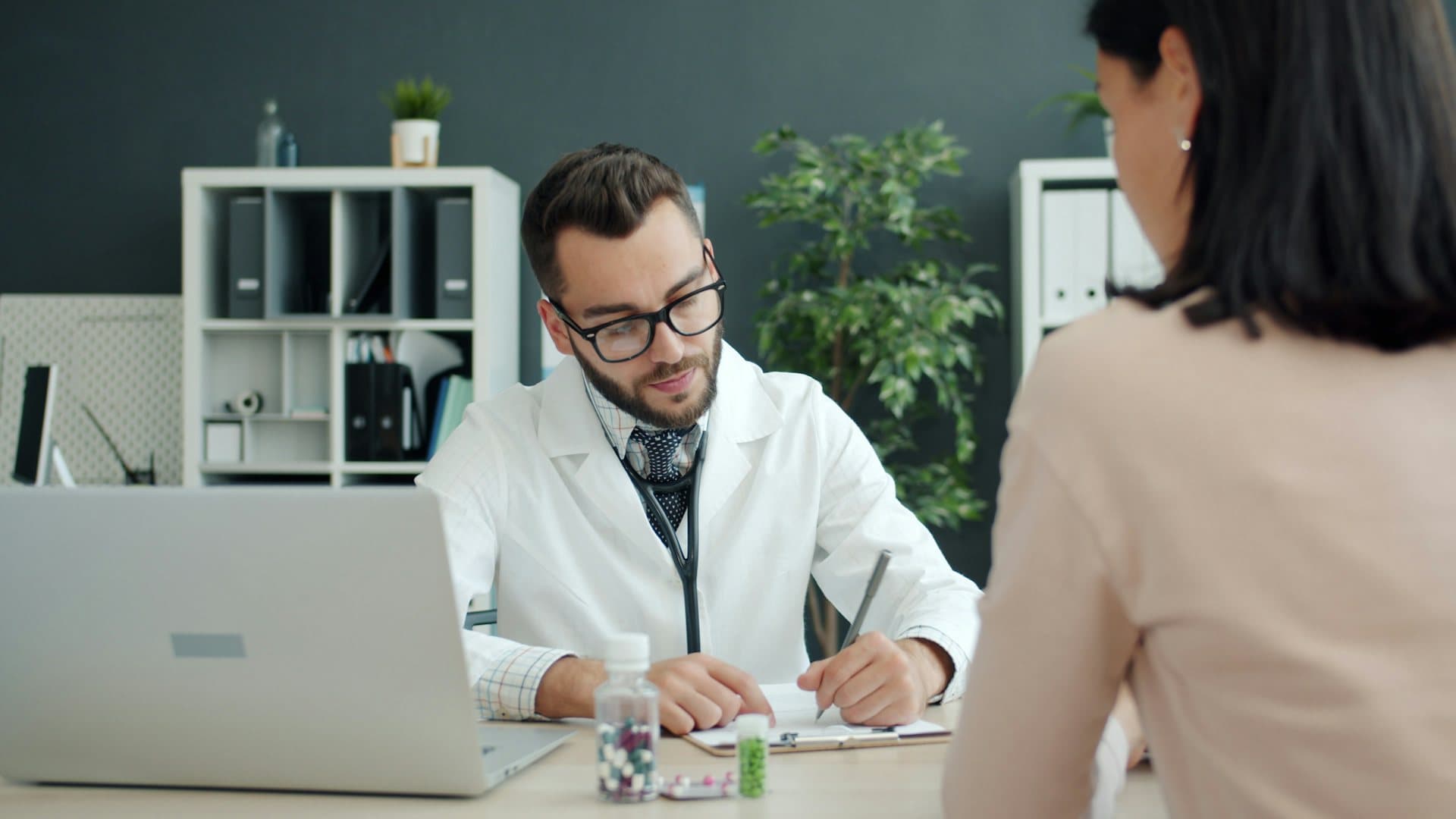 A doctor in India consulting with an international patient